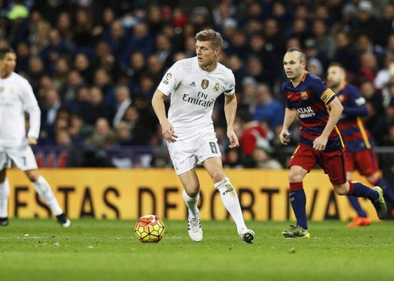 Toni Kroos and Andres Iniesta in Action During El Clasico