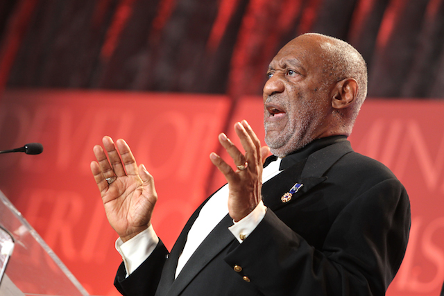 Bill Cosby addresses the audience at an awards ceremony.