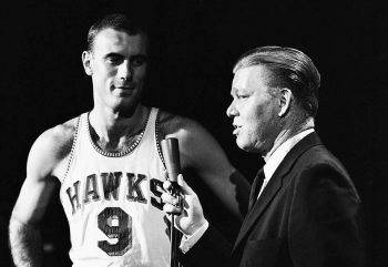 Bob Pettit (L) is interviewed in 1958.