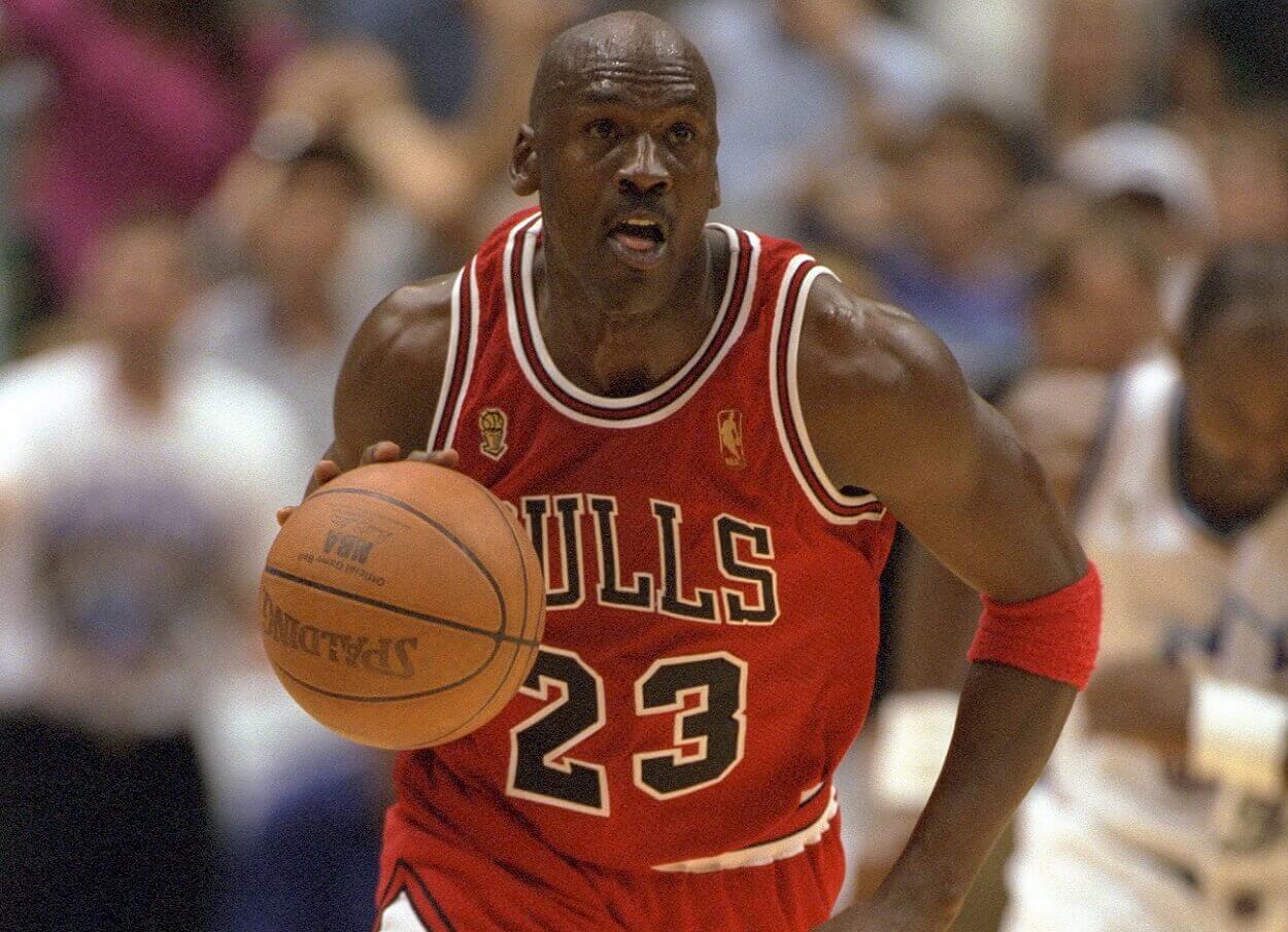 Chicago Bulls Michael Jordan holds the 1991 NBA Finals MVP trophy