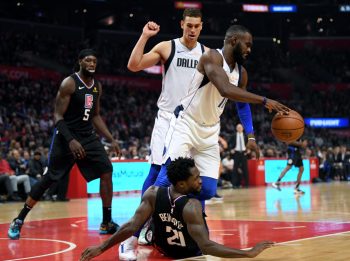 Tim Hardaway Jr. steps over Patrick Beverly