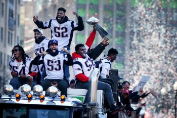 New England Patriots players Dont'a Hightower (54), Albert McClellan (59) ,Elandon Roberts (52) , Kyle Van Noy (53) and Ja'Whaun Bentley (51) enjoy the 2019 Super Bowl victory parade