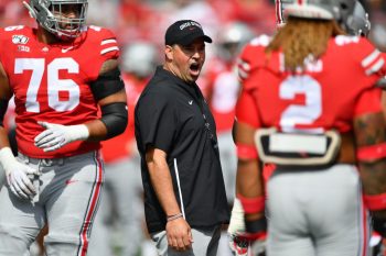 Head coach Ryan Day of the Ohio State Buckeyes shouts instructions to his team