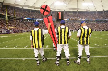 An NFL chain gain crew on the sideline