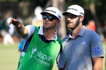 Dustin Johnson talks to his brother and caddie Austin Johnson