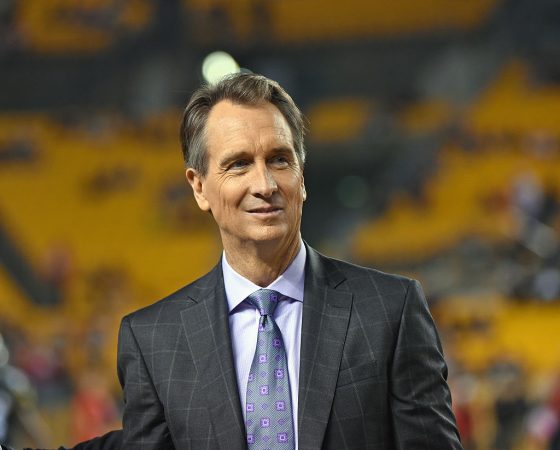 Why Does Cris Collinsworth Slide in the NFL Booth?