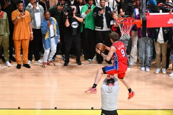 Mac McClung of the Philadelphia 76ers dunks.