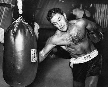 Rocky Marciano hitting a heavy bag