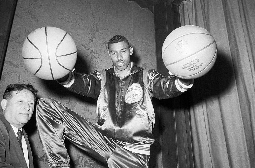 Wilt Chamberlain as a member of the Harlem Globetrotters : r/Colorization
