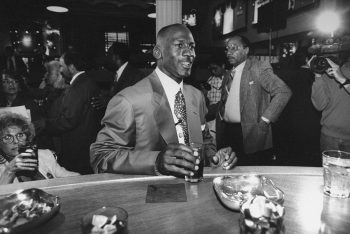 Chicago Bulls basketball star Michael Jordan holding drink