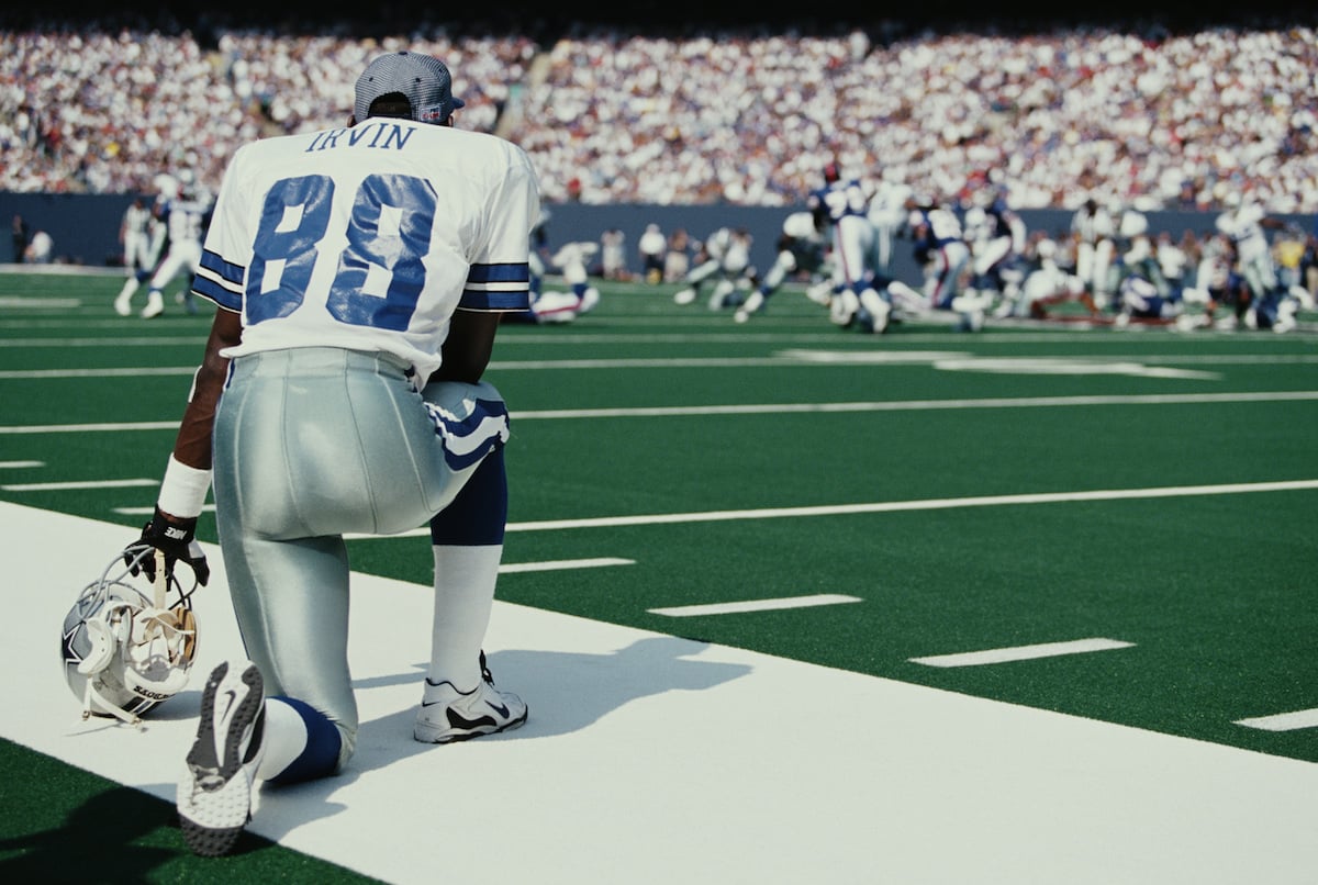 Wide receiver Michael Irvin of the Dallas Cowboys gets tackled during  News Photo - Getty Images