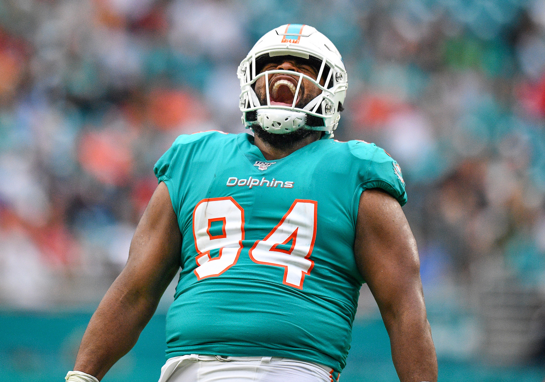 Dolphins' Wilkins ends hold-in despite not signing new deal