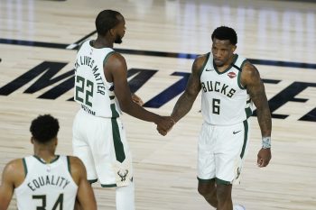 Veterans Khris Middleton and Eric Bledsoe stepped up for the Milwaukee Bucks on Sunday.