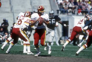 Why did Joe Theismann wear a single-bar facemask?