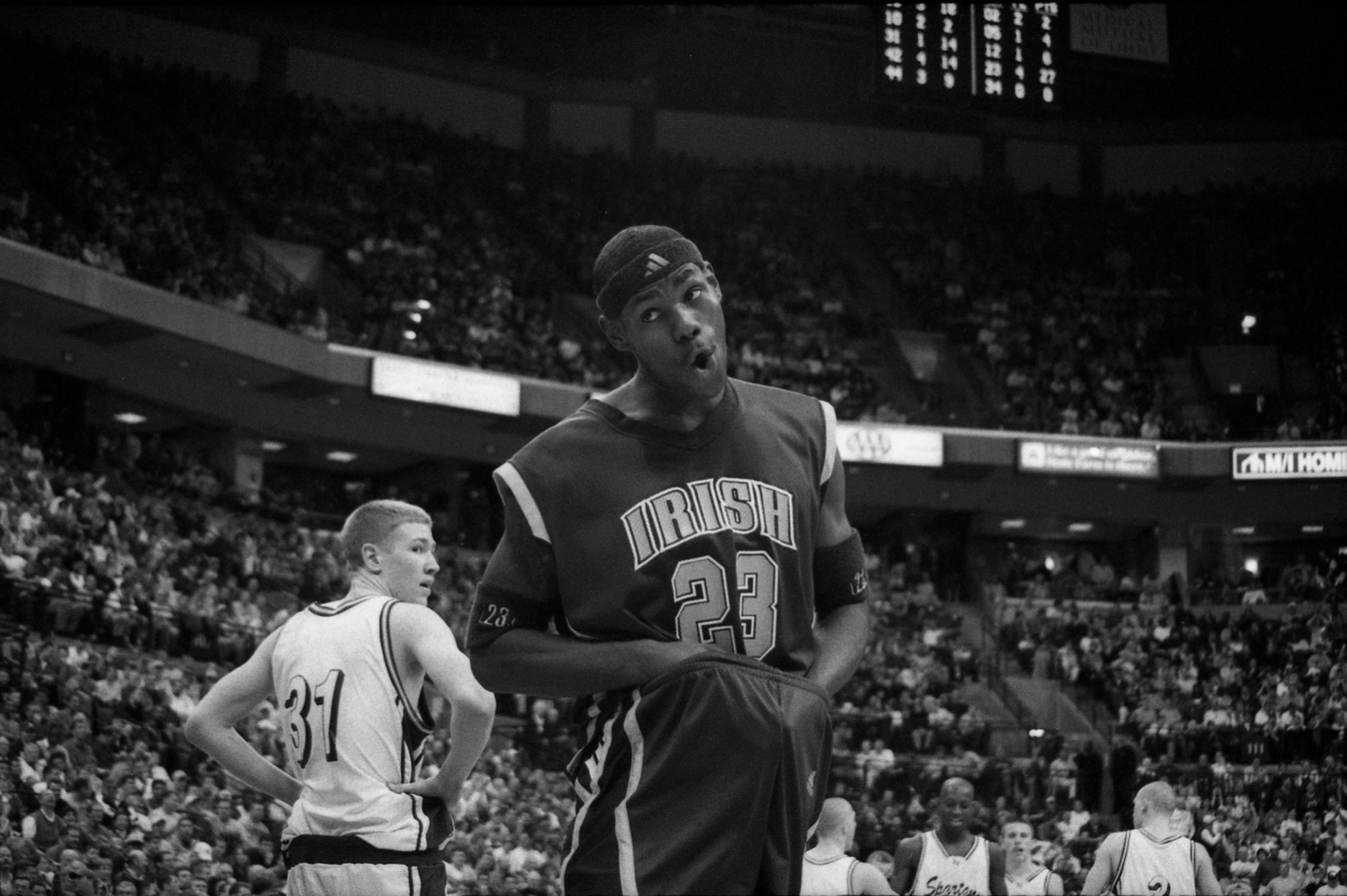 LeBron James smiles while playing for St. Vincent-St. Mary High School.