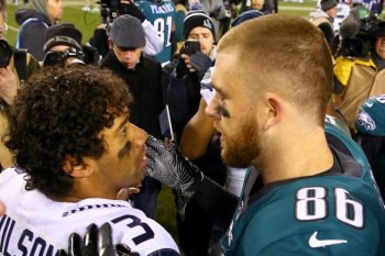 Seattle Seahawks QB Russell Wilson and Philadelphia Eagles TE Zach Ertz embrace after a game