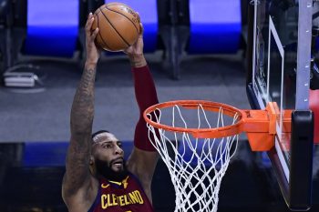 LA Lakers center Andre Drummond, then of the Cleveland Cavaliers, dunks during an NBA game.