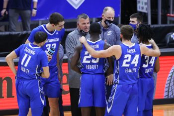 Creighton huddles up with head coach Sean McDermott