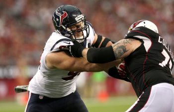 J.J. Watt of the Houston Texans battles guard Dayrn Colledge of the Arizona Cardinals during a 2013 game at University of Phoenix Stadium.