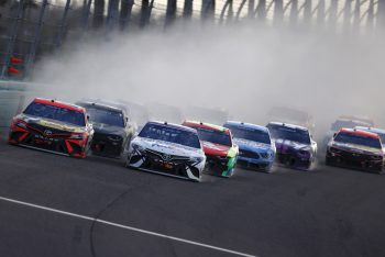 Martin Truex races Denny Hamlin