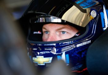 Dale Earnhardt Jr. sits in car before practice