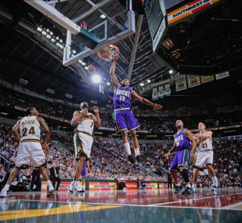 Milwaukee Bucks forward Glenn Robinson dunks against the Seattle SuperSonics.