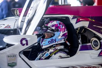 NASCAR legend Jimmie Johnson sits in his IndyCar in January 2021