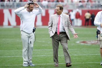 Texas Longhorns head coach Steve Sarkisian speaks to Nick Saban during his days as Alabama's offensive coordinator.