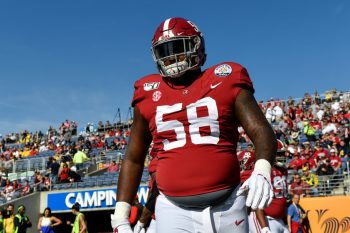 Alabama Crimson Tide defensive lineman Christian Barmore warms up before a game.