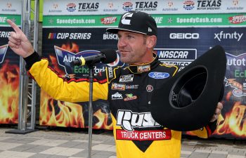 Clint Bowyer speaks to the crowd at the end of his NASCAR career.