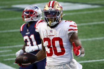 Jeff Wilson Jr. of the San Francisco 49ers scores a touchdown against the New England Patriots at Gillette Stadium on Oct. 25, 2020 in Foxborough, Mass.