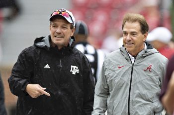 Nick Saban and Jimbo Fisher talk before a game