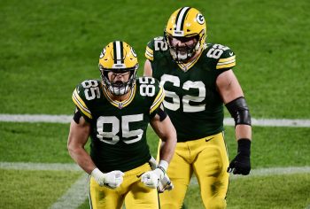 Packers tight end Robert Tonyan celebrates scoring a touchdown with teammate Lucas Patrick.