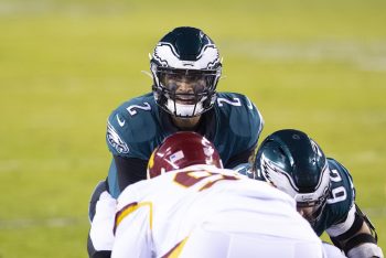 Jalen Hurts of the Philadelphia Eagles looks over the Washington Football Team defense on Jan. 3, 2021.