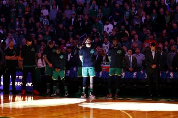 Jayson Tatum watches a tribute to his late friend Kobe Bryant.