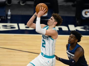 LaMelo Ball, Anthony Edwards face each other in a game in Minnesota in March 2021.