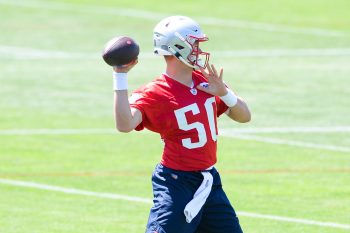 Mac Jones in action during New England Patriots mincamp.