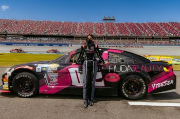 Toni Breidinger poses with her car during the 2021 ARCA Menards Series campaign.