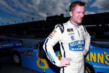 Dale Earnhardt Jr. stands outside his car in 2019.