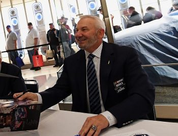 Dale Jarrett signs autographs at the NASCAR Hall of Fame on Jan. 20, 2017, in Charlotte, North Carolina.