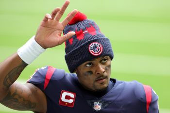 Houston Texans quarterback Deshaun Watson waves to the crowd after a game.