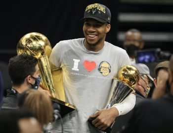 Milwaukee Giannis Antetokounmpo celebrates winning the 2021 NBA championship.