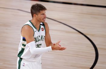 Kyle Korver claps during a Milwaukee Bucks game last season.