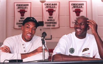 Michael Jordan and Scottie Pippen sit together at a Chicago Bulls press conference.