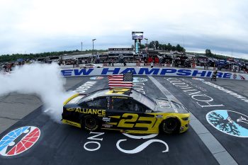 Brad Keselowski celebrates after winning the 2020 NASCAR Cup Series Foxwoods Resort Casino 301 at New Hampshire Motor Speedway