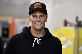 Tampa Bay Buccaneers quarterback Tom Brady arrives backstage at UFC 261 on April 24, 2021, in Jacksonville, Florida.