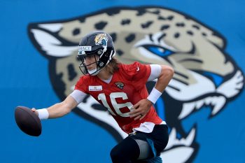 Jacksonville Jaguars quarterback Trevor Lawrence performs a drill during minicamp.