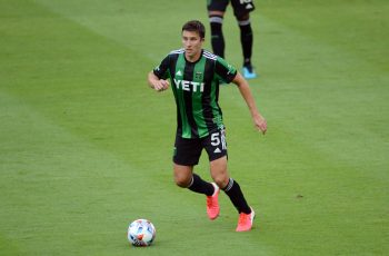 Austin FC defender Matt Besler moves ball