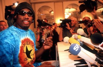 NBA Hall of Famer Dennis Rodman poses with his book. The basketball star once partied with Dan Patrick, although he thought he was Craig Sager.