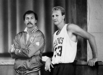 Chris Ford and Larry BIrd watch a practice game at Celtics rookie camp at Hellenic College in Brookline on Oct. 4, 1987.